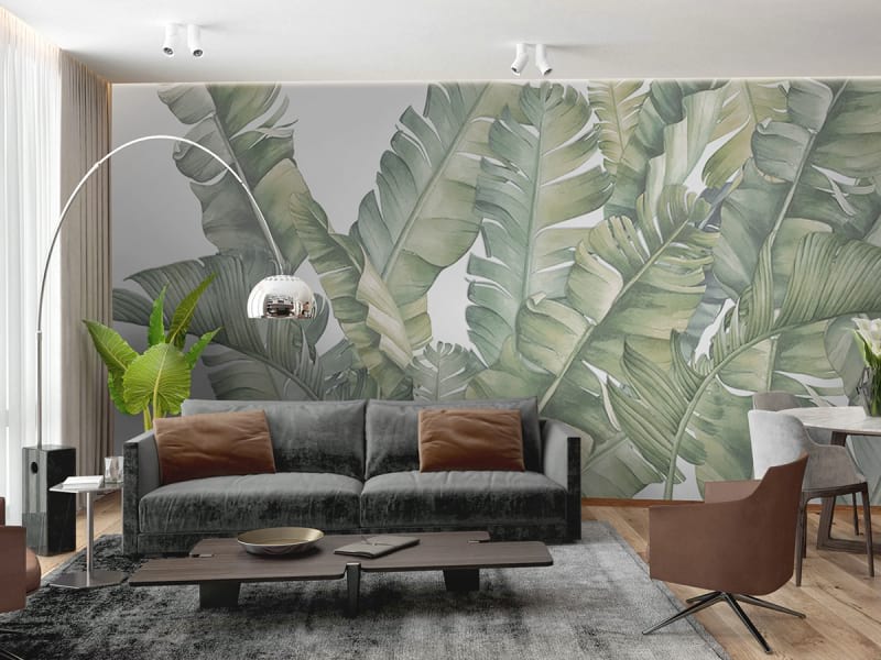 Фотообои Рисунок тропические листья в интерьере гостиной