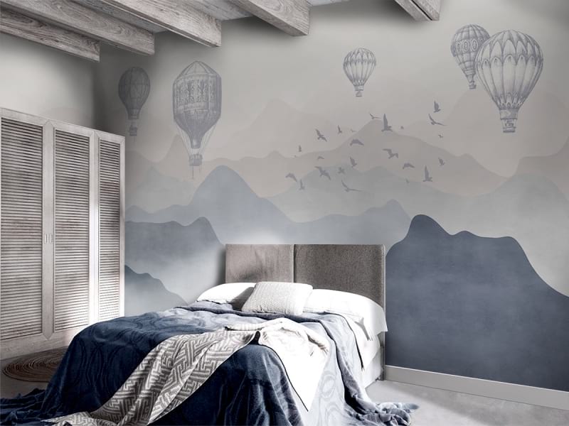 Фотошпалери Аеростати над синіми горами в інтер'єрі спальні