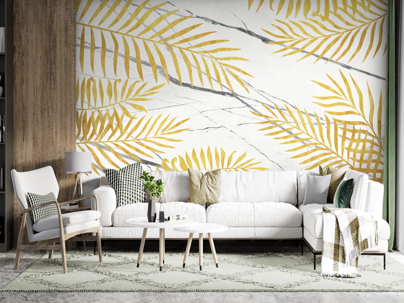 Фотошпалери Золоте листя на мармурі в інтер'єрі вітальні
