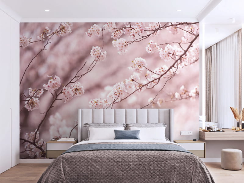 Фотошпалери Сакура рожева в інтер'єрі спальні