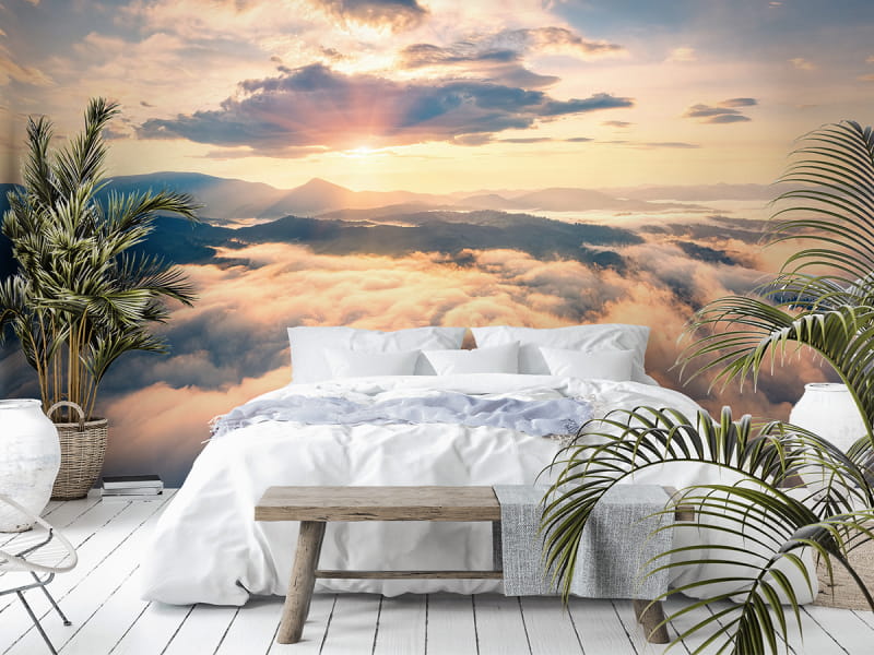 Фотообои Рассвет над облаками в интерьере спальни