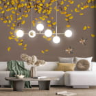 Мініатюра фотошпалер Золоте листя та птахи в інтер'єрі вітальні