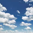 Превью фотообоев Голубое небо с облаками